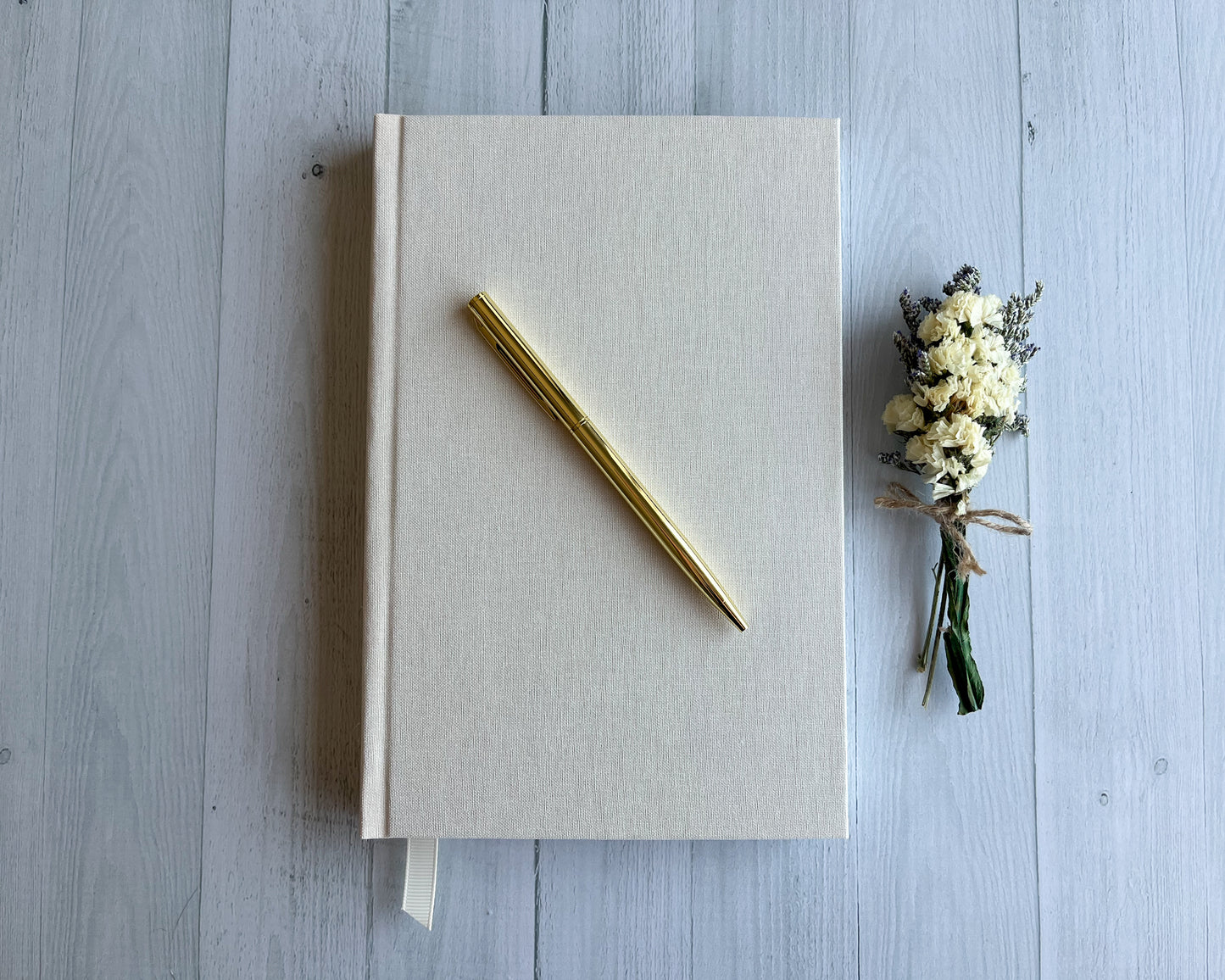 Signature Classic handbound journal in Moonlight ivory linen bookcloth with grosgrain ribbon bookmark and pearl cream endpapers.