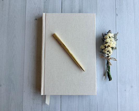 Signature Classic handbound journal in Moonlight ivory linen bookcloth with grosgrain ribbon bookmark and pearl cream endpapers.